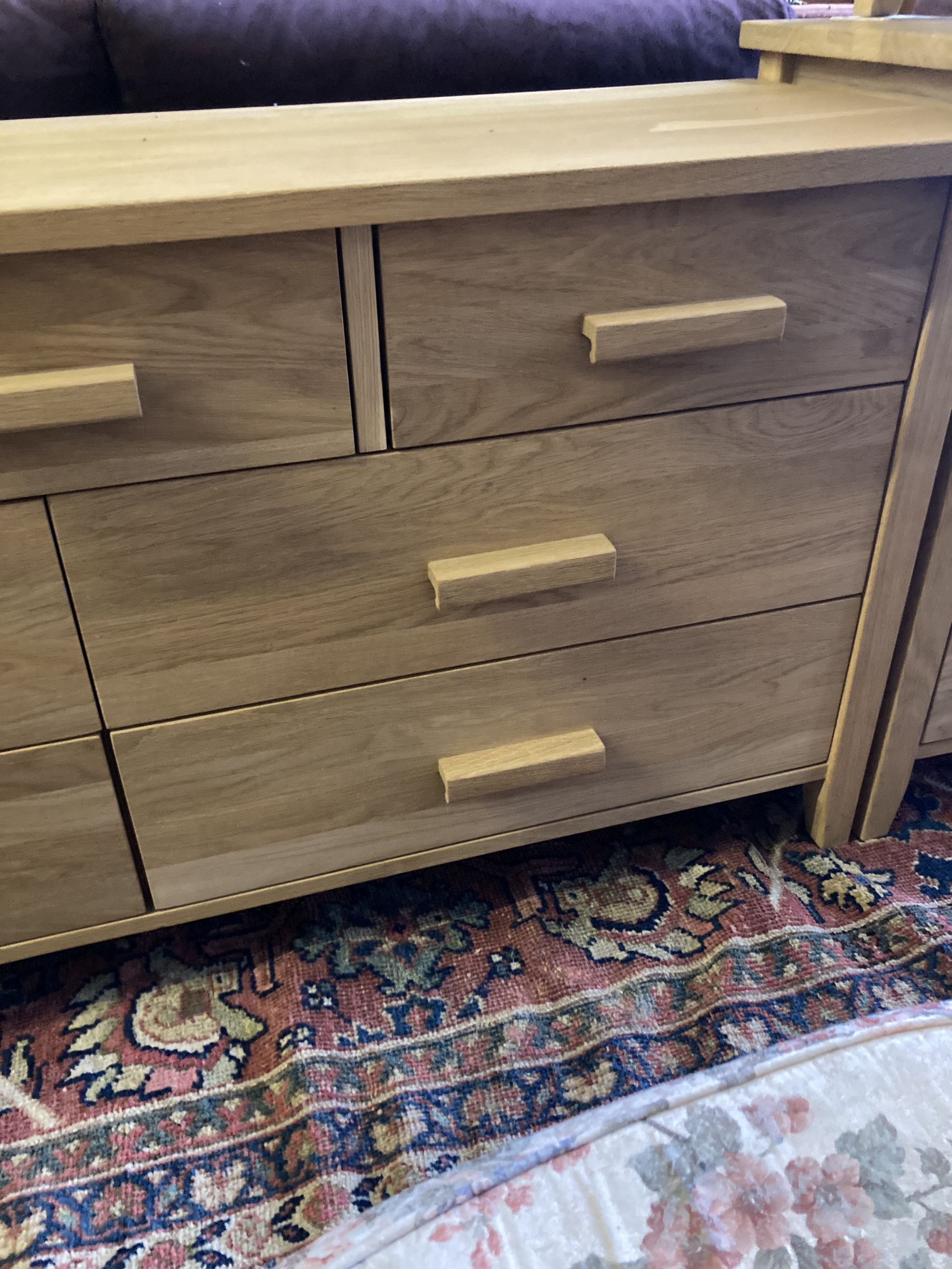 A modern contemporary oak seven-drawer chest, width 150cm, depth 45cm, height 71cm